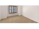 Simple bedroom with neutral colored walls and carpet at 5450 E Deer Valley Dr # 2206, Phoenix, AZ 85054
