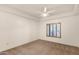 Spacious secondary bedroom with neutral carpeting and large window at 5450 E Deer Valley Dr # 2206, Phoenix, AZ 85054