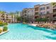 Inviting resort-style pool with a waterfall feature at 5450 E Deer Valley Dr # 2206, Phoenix, AZ 85054