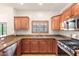 Modern kitchen boasting stainless steel appliances and ample cabinetry at 5450 E Deer Valley Dr # 2206, Phoenix, AZ 85054