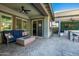 Covered patio with fire pit and comfortable seating at 28001 N 92Nd Ave, Peoria, AZ 85383