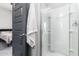 Modern bathroom with a shower stall and a towel rack at 28001 N 92Nd Ave, Peoria, AZ 85383