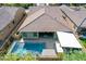 Home with pool, patio, and outdoor kitchen at 28001 N 92Nd Ave, Peoria, AZ 85383