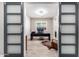 Home office with hardwood floors and stylish barn doors at 28001 N 92Nd Ave, Peoria, AZ 85383