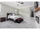 Primary bedroom with fireplace and access to the bathroom at 28001 N 92Nd Ave, Peoria, AZ 85383