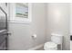 Small bathroom with toilet and single vanity at 28001 N 92Nd Ave, Peoria, AZ 85383