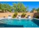 Clean lines and a refreshing pool in the backyard at 28001 N 92Nd Ave, Peoria, AZ 85383