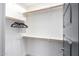 Spacious walk-in closet with ample shelving and hanging space at 28001 N 92Nd Ave, Peoria, AZ 85383