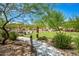 Community park with walking path and shaded seating at 28001 N 92Nd Ave, Peoria, AZ 85383