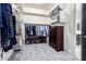 Spacious walk-in closet with ample shelving and dresser at 28001 N 92Nd Ave, Peoria, AZ 85383