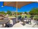 Relaxing community park with shaded seating and tables at 28001 N 92Nd Ave, Peoria, AZ 85383