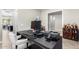 Well-lit home office featuring a large desk and printer at 28001 N 92Nd Ave, Peoria, AZ 85383