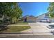 Single-story house with a two-car garage and manicured lawn at 3677 E Park Ave, Gilbert, AZ 85234