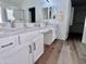 Double vanity bathroom with quartz countertop and walk-in shower at 22325 N 78Th Dr, Peoria, AZ 85383