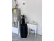 Garage with water heater, water softener and utility sink at 22325 N 78Th Dr, Peoria, AZ 85383