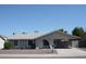 Single-story home with attached carport and well-maintained landscaping at 6604 W Vogel Ave, Glendale, AZ 85302