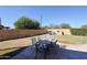 Enjoy outdoor dining and relaxation on this large patio with built-in fire pit at 26028 N 66Th Dr, Phoenix, AZ 85083