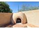 Charming outdoor fireplace perfect for cool evenings at 26028 N 66Th Dr, Phoenix, AZ 85083