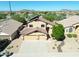 Two-story home with a three-car garage and solar panels at 26028 N 66Th Dr, Phoenix, AZ 85083