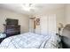 Bedroom with double bed, dresser, and ceiling fan at 26028 N 66Th Dr, Phoenix, AZ 85083