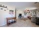Gathering room featuring built-in shelving and a comfortable couch at 26028 N 66Th Dr, Phoenix, AZ 85083