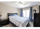 Comfortable bedroom with double bed and ceiling fan at 26028 N 66Th Dr, Phoenix, AZ 85083