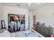 Bedroom with large closet and access to hallway at 26028 N 66Th Dr, Phoenix, AZ 85083
