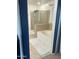 Bathroom with shower, tub, and updated fixtures at 18527 W Caribbean Ln, Surprise, AZ 85388