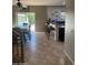 Kitchen with breakfast bar and adjacent dining area at 18527 W Caribbean Ln, Surprise, AZ 85388
