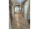 Spacious entryway with tile flooring and a large mirror at 18527 W Caribbean Ln, Surprise, AZ 85388