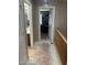 Upstairs hallway with access to bedrooms and bathroom at 18527 W Caribbean Ln, Surprise, AZ 85388