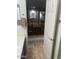 Upstairs hallway with access to bedrooms and bathroom at 18527 W Caribbean Ln, Surprise, AZ 85388