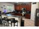 Large kitchen with stainless steel appliances and an island at 18527 W Caribbean Ln, Surprise, AZ 85388