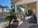 Relaxing patio with pool access and seating area at 18527 W Caribbean Ln, Surprise, AZ 85388