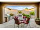 Outdoor patio with fireplace, seating area, and built-in grill at 3129 S Honeysuckle Ct, Gold Canyon, AZ 85118