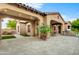 Large patio with seating area and landscaping at 3129 S Honeysuckle Ct, Gold Canyon, AZ 85118