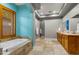 Spa-like bathroom with a soaking tub and double vanity at 3129 S Honeysuckle Ct, Gold Canyon, AZ 85118
