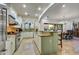 Large kitchen with stainless steel appliances and an island at 3129 S Honeysuckle Ct, Gold Canyon, AZ 85118