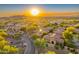 Community overview at sunset, featuring houses and landscape at 3129 S Honeysuckle Ct, Gold Canyon, AZ 85118