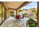 Outdoor patio with seating area and fireplace at 3129 S Honeysuckle Ct, Gold Canyon, AZ 85118