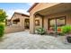 Spacious outdoor patio with seating area and built-in grill at 3129 S Honeysuckle Ct, Gold Canyon, AZ 85118
