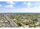 Aerial view of neighborhood with distant city skyline at 4350 E Vermont Ave, Phoenix, AZ 85018