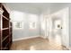 Bright office with built-in shelving and access to another room at 1547 W Vernon Ave, Phoenix, AZ 85007