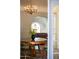 Elegant dining room with chandelier and hardwood floors at 1547 W Vernon Ave, Phoenix, AZ 85007