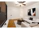 Finished basement with a sofa and media center at 1547 W Vernon Ave, Phoenix, AZ 85007