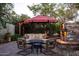 Cozy patio area with seating and fireplace at 1547 W Vernon Ave, Phoenix, AZ 85007