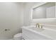 Modern bathroom with single vanity and quartz countertop at 9214 W Kerry Ln, Peoria, AZ 85382