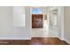 Bright and airy entryway with hardwood floors and elegant double doors at 9214 W Kerry Ln, Peoria, AZ 85382