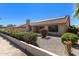 Home with solar panels and a landscaped backyard at 9214 W Kerry Ln, Peoria, AZ 85382