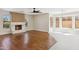 Living area with a fireplace and bay window at 9214 W Kerry Ln, Peoria, AZ 85382